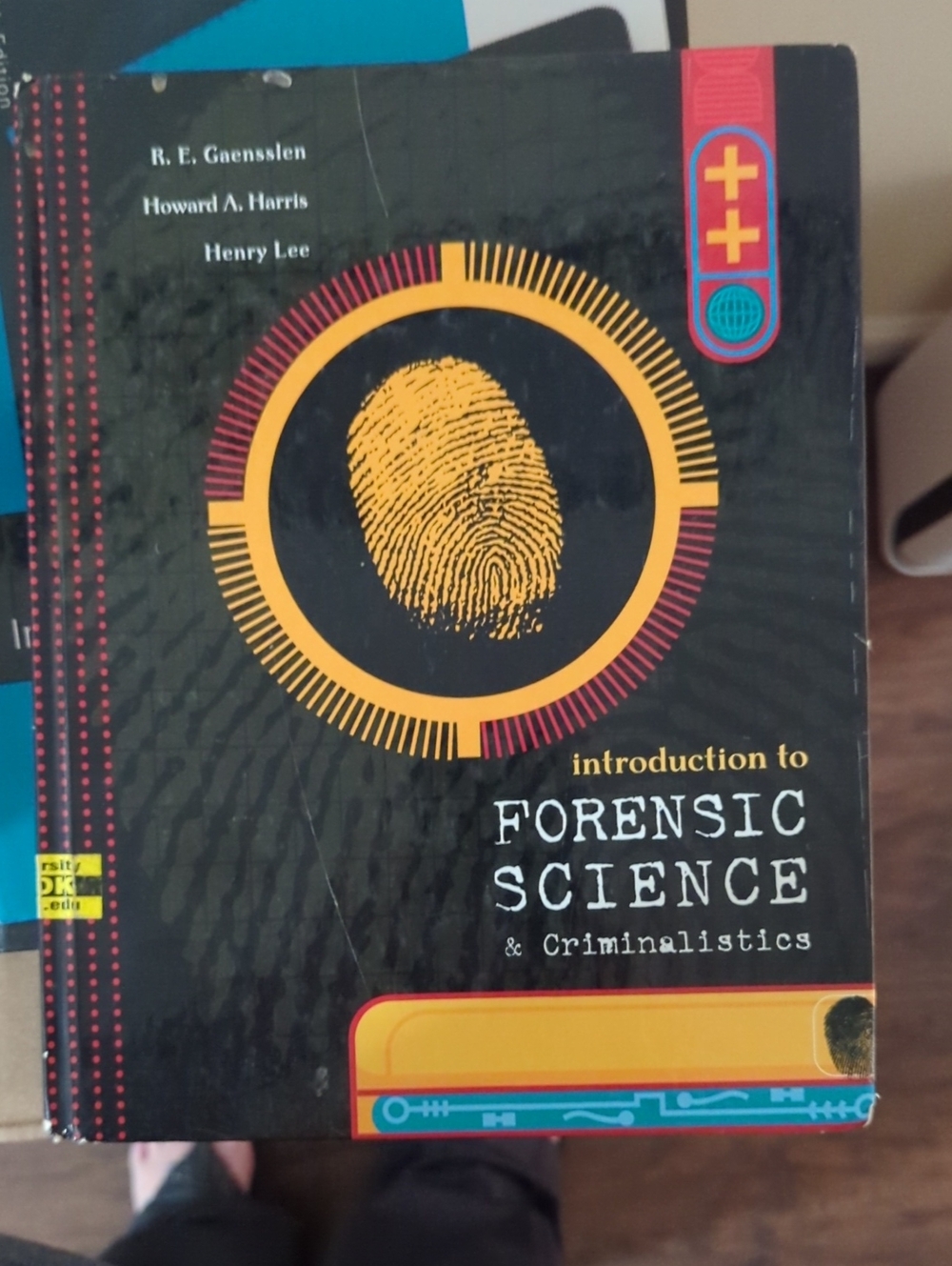 Forensic Science & Criminalistics Textbook - Black with Yellow Accent